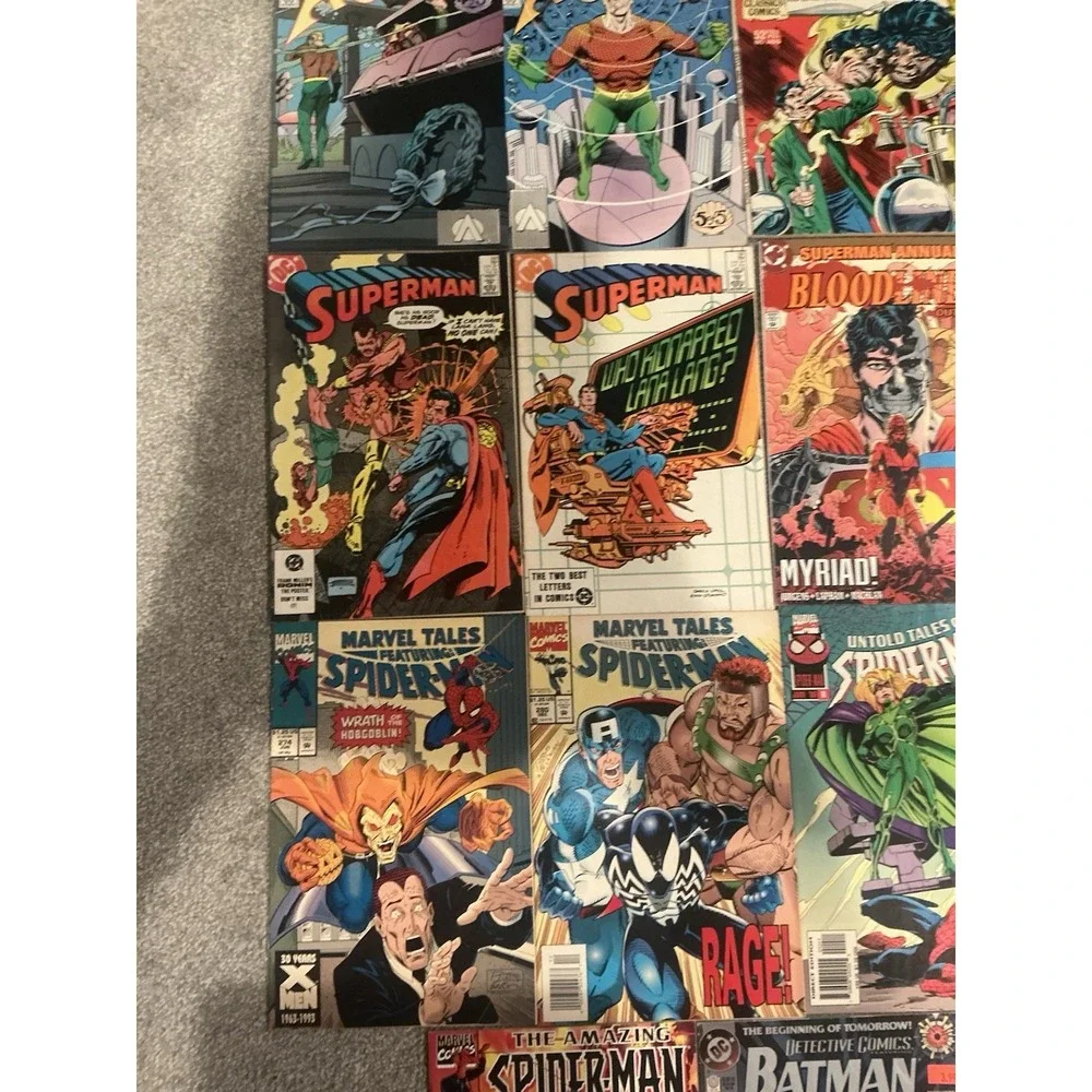 Vintage 15 lot of superhero comic books from both DC and Marvel publishers.